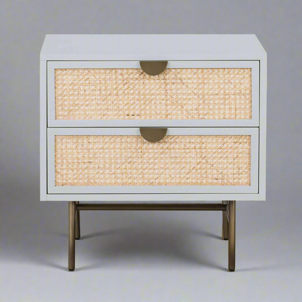 Two-drawer nightstand with wicker texture and metal handles on a white background