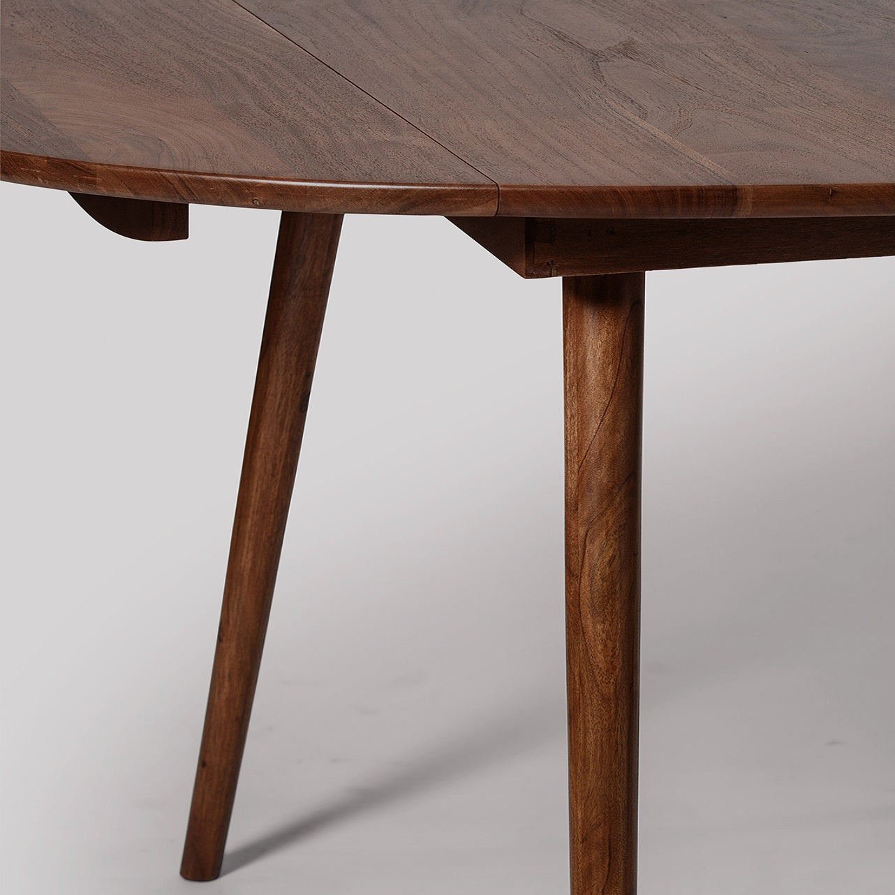 Round Extendable Dining Table