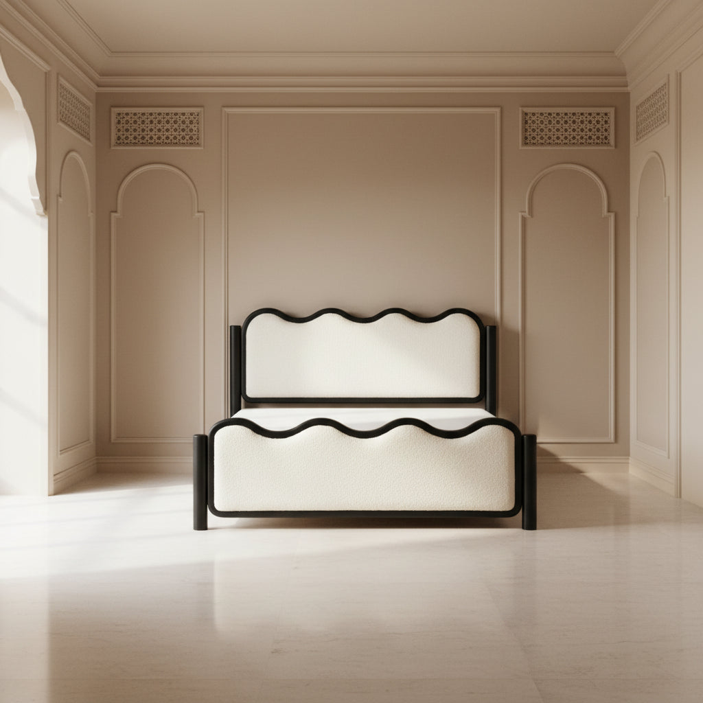 Bed with black frame and white upholstered headboard and footboard on a white background