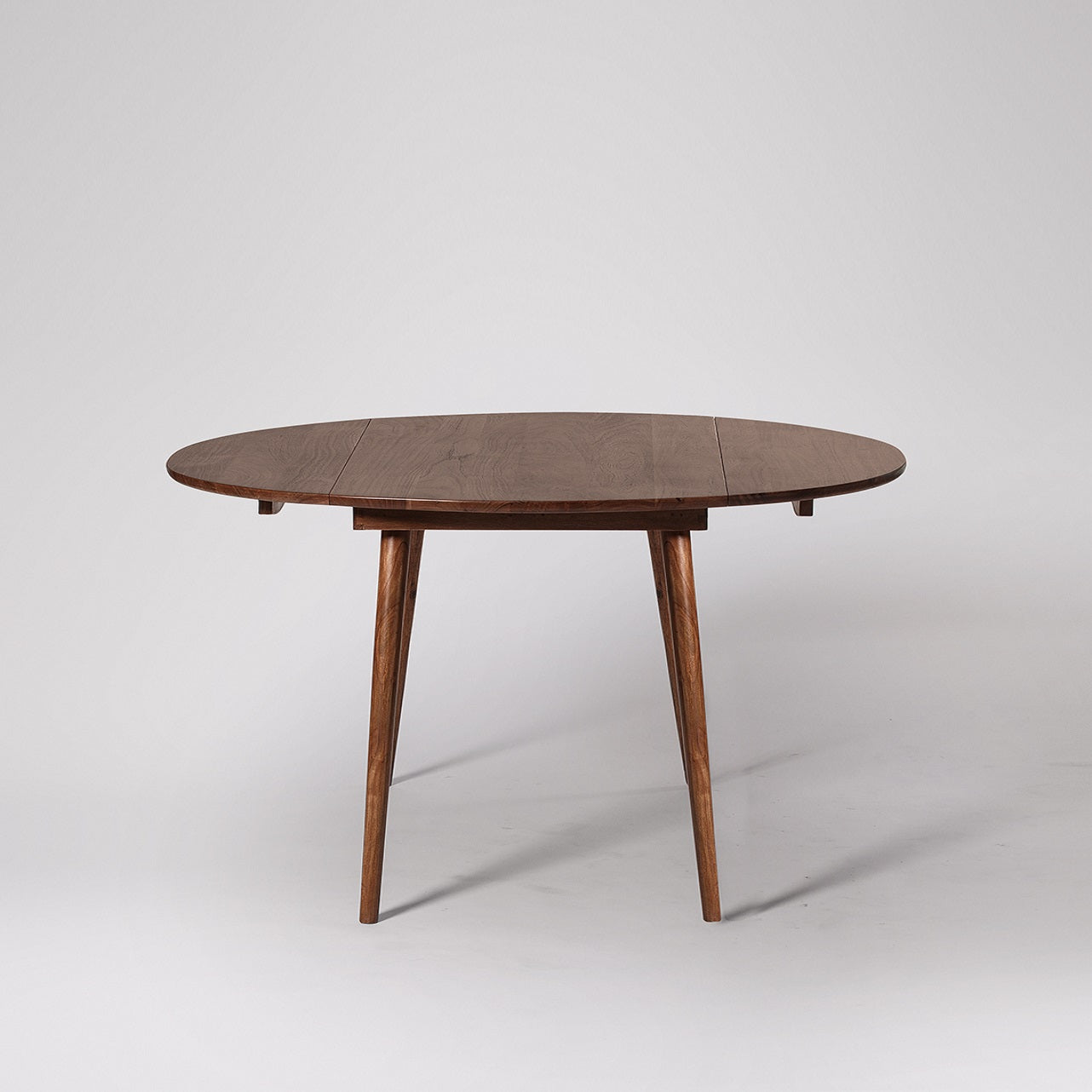 Round Extendable Dining Table