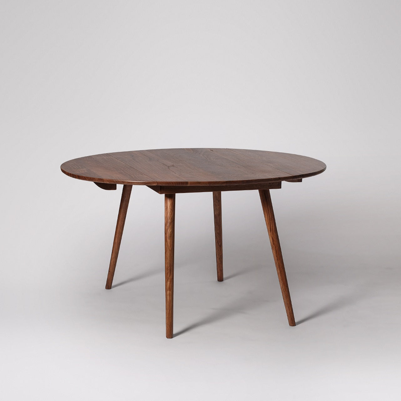 Round Extendable Dining Table