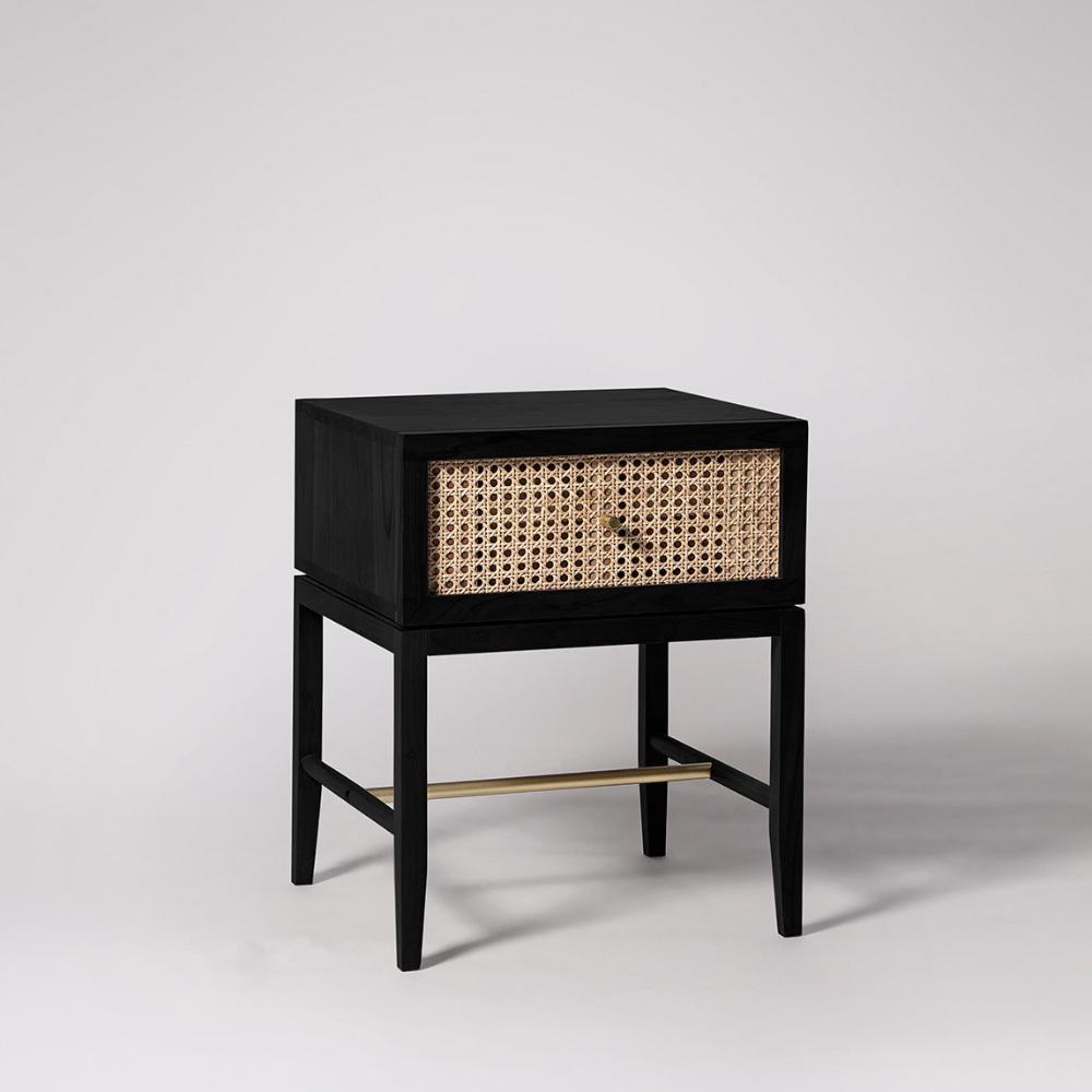 Raphia Bedside Table in ebony black finish with woven cane drawer fronts, elegant nightstand with brass accents
